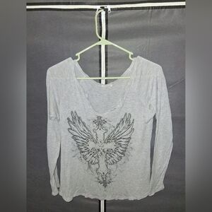 Free Kisses Light Gray Long Sleeve V-Neck Top with Winged Cross Graphic